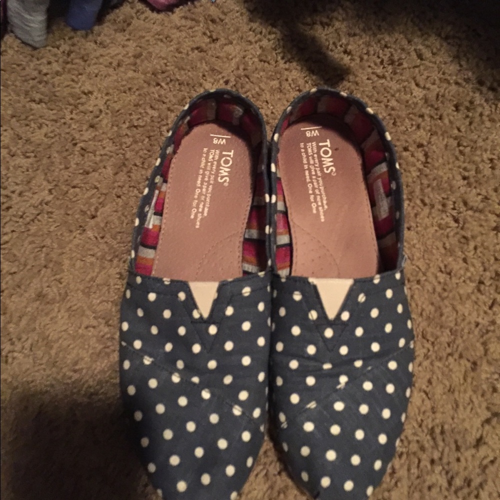 Navy and cream Toms.